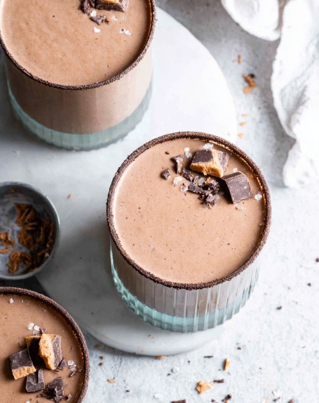 Ready-to-serve chocolate smoothies in cups, beautifully topped with chocolate chunks and a sprinkle of coarse sea salt.