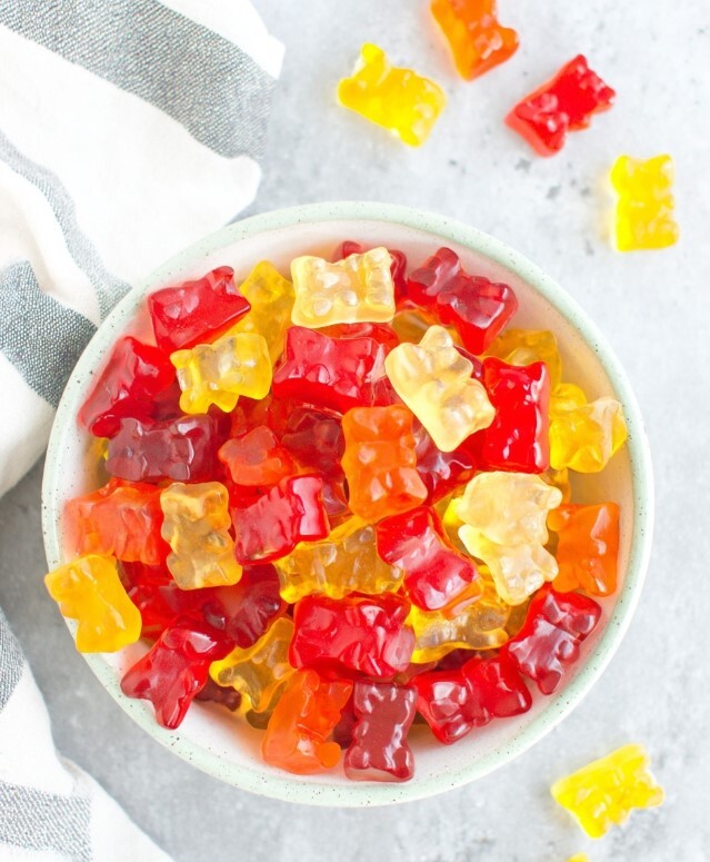 The final result after the mixture has set and been cut/shaped, colorful gelatin bears ready to eat and serve.