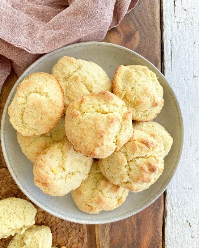 Golden baked biscuits ready to serve on a plate