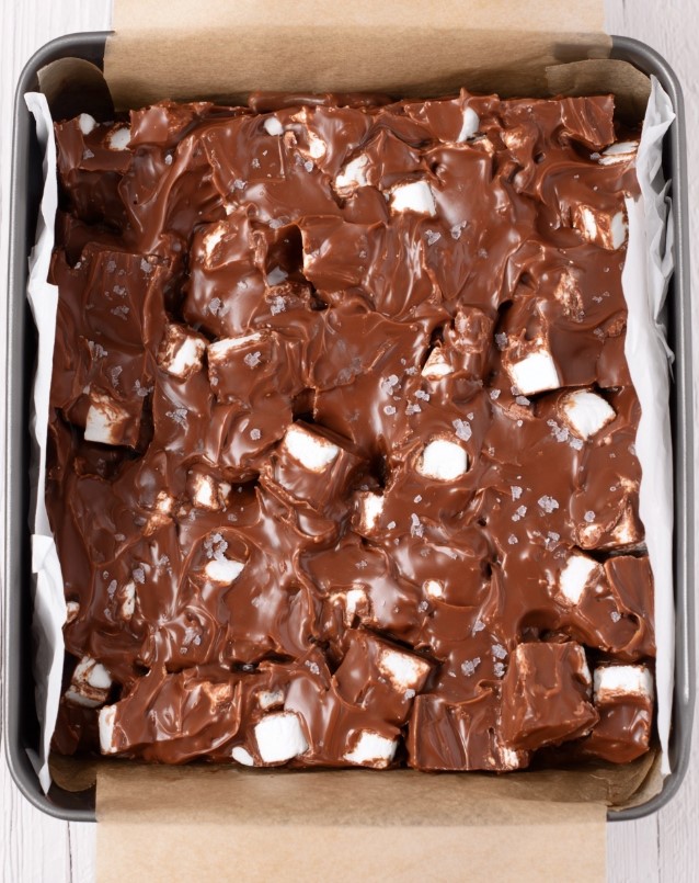 Sugar free peanut butter chocolate bars - chocolate marshmallow mixture spread in the pan before refrigeration